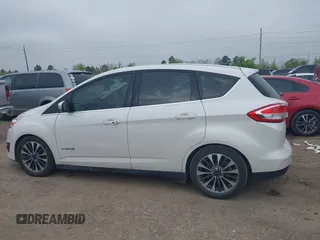 2018 Ford C-Max Titanium with VIN 1FADP5DUXJL104279, listed as a IAAI auction lot 41882275 with 55,137 mi miles and . Bid and sale history available at DreamBid. Image 14.