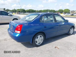 2003 Hyundai Elantra GLS z VIN KMHDN45D53U476937, wystawiony jako IAAI lot #42286976 z przebiegiem Nie podano mil oraz . Historia ofert i sprzedaży dostępna na DreamBid. Obrazek 4.