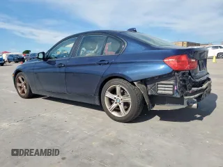 2015 BMW 3 Series 320i with VIN WBA3B1C58FK140327, listed as a Copart auction lot 57999675 with 124,437 mi miles and Salvage title. Bid and sale history available at DreamBid. Image 2.