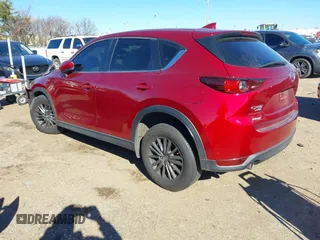 2019 Mazda CX-5 Sport with VIN JM3KFBBM2K0508743, listed as a IAAI auction lot 41288659 with 77,710 mi miles and . Bid and sale history available at DreamBid. Image 3.