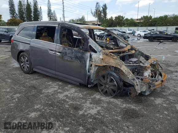 2015 Honda Odyssey Touring Elite with VIN 5FNRL5H90FB129008, listed as a Copart auction lot 47995945 with Not provided miles and Non repairable. Bid and sale history available at DreamBid. Image 4.