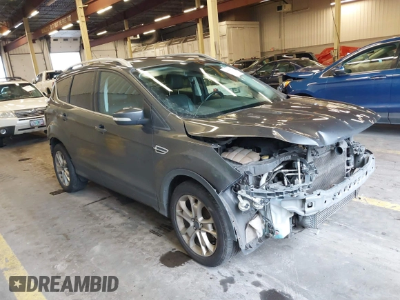 2016 Ford Escape Titanium with VIN 1FMCU9J92GUB63525, listed as a IAAI auction lot 41469824 with 156,773 mi miles. Bid and sale history available at carsss.com. Image 1.
