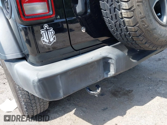 2019 Jeep Wrangler Sport S with VIN 1C4GJXAG2KW664395, listed as a IAAI auction lot 42683888 with 72,742 mi miles and . Bid and sale history available at DreamBid. Image 6.