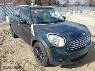 2013 MINI Cooper Countryman with VIN WMWZB3C58DWM09440, listed as a IAAI auction lot 41696396 with 52,930 mi miles. Bid and sale history available at carsss.com. Image 1.