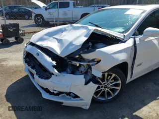 2018 Ford Fusion Energi SE with VIN 3FA6P0PU9JR105934, listed as a IAAI auction lot 41935227 with 149,863 mi miles. Bid and sale history available at carsss.com. Image 6.