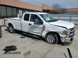 2022 Ford F-250 XL with VIN 1FT8X2BT1NEC84704, listed as a Copart auction lot 51142375 with 125,589 mi miles and Salvage Title. Bid and sale history available at DreamBid. Image 4.