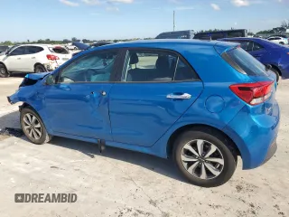 2023 Kia Rio S with VIN 3KPA25AD9PE548173, listed as a Copart auction lot 50232915 with 26,668 mi miles and Salvage Title. Bid and sale history available at DreamBid. Image 2.