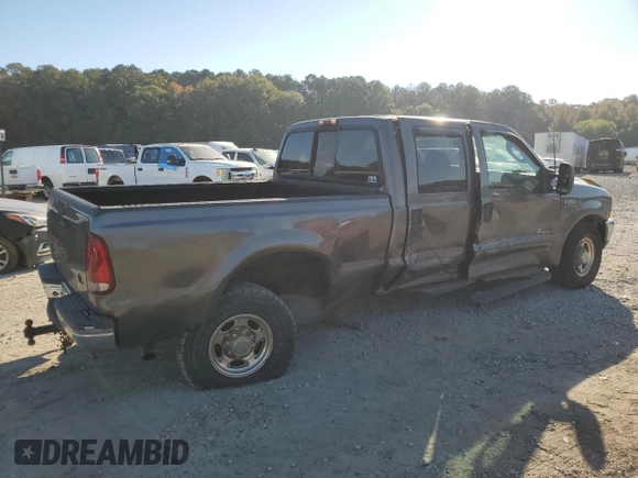 2003 Ford Super Duty F-250 XL with VIN 1FTNW20F73EB02536, listed as a Copart auction lot 77330394 with 170,102 mi miles and Salvage Title. Bid and sale history available at carsss.com. Image 3.