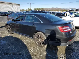 2014 Ford Taurus Limited z VIN 1FAHP2J8XEG170806, wystawiony jako Copart lot #84871394 z przebiegiem 170 124 mil mil oraz Czysty tytuł • Clean title. Historia ofert i sprzedaży dostępna na DreamBid. Obrazek 2.