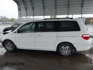 2007 Honda Odyssey EX-L z VIN 5FNRL38717B400727, wystawiony jako IAAI lot #42247147 z przebiegiem 199 430 mil mil oraz . Historia ofert i sprzedaży dostępna na DreamBid. Obrazek 14.