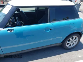 2007 MINI Hardtop with VIN WMWMF335X7TT54929, listed as a IAAI auction lot 42173757 with 71,496 mi miles and . Bid and sale history available at DreamBid. Image 6.