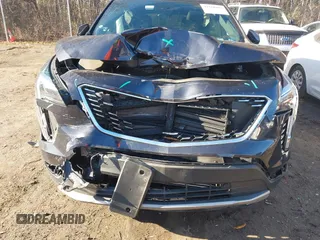 2022 Cadillac XT4 AWD Premium Luxury with VIN 1GYFZDR40NF139931, listed as a IAAI auction lot 41168482 with 28,748 mi miles and . Bid and sale history available at carsss.com. Image 6.