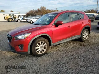 2015 Mazda CX-5 Sport with VIN JM3KE4BE7F0449623, listed as a Copart auction lot 78989944 with 154,156 mi miles and Salvage title. Bid and sale history available at DreamBid. Image 1.