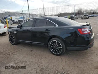 2018 Ford Taurus SEL with VIN 1FAHP2E8XJG137910, listed as a Copart auction lot 50883605 with 104,425 mi miles and Salvage Title. Bid and sale history available at carsss.com. Image 2.