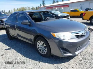 2014 Toyota Camry L with VIN 4T4BF1FK9ER423232, listed as a IAAI auction lot 41980213 with 157,132 mi miles. Bid and sale history available at carsss.com. Image 1.