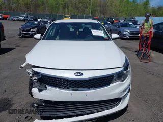 2018 Kia Optima LX with VIN 5XXGT4L31JG261091, listed as a IAAI auction lot 42168652 with 68,070 mi miles. Bid and sale history available at carsss.com. Image 12.