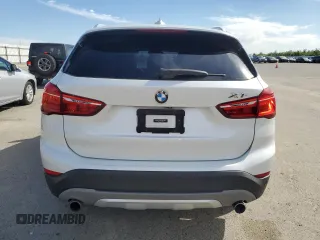 2016 BMW X1 xDrive28i z VIN WBXHT3C31GP880552, wystawiony jako Copart lot #52931305 z przebiegiem 127 225 mil mil oraz Szkoda całkowita • Salvage title. Historia ofert i sprzedaży dostępna na DreamBid. Obrazek 6.