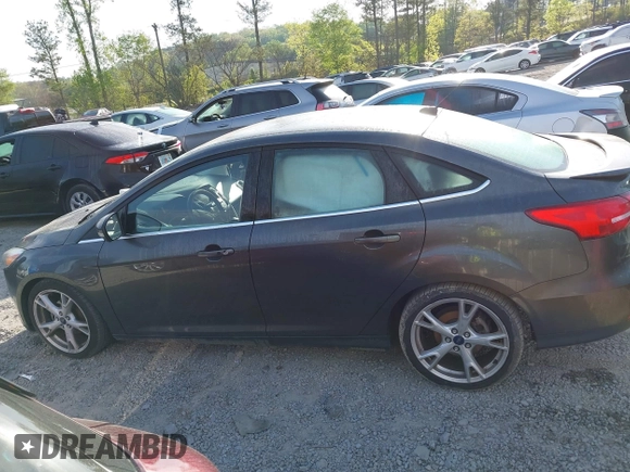 2016 Ford Focus Titanium with VIN 1FADP3J25GL282293, listed as a IAAI auction lot 41998959 with 119,781 mi miles and . Bid and sale history available at DreamBid. Image 14.
