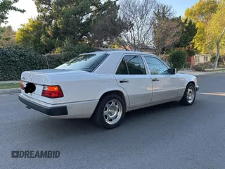 1992 Mercedes-Benz 400 with VIN WDBEA34E4NB705887, listed as a Copart auction lot 48637485 with 76,661 mi miles and Clean Title. Bid and sale history available at carsss.com. Image 4.