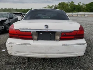 2003 Mercury Grand Marquis GS Convenience z VIN 2MEFM74WX3X633910, wystawiony jako Copart lot #52999865 z przebiegiem 207 970 mil mil oraz Szkoda całkowita • Salvage title. Historia ofert i sprzedaży dostępna na DreamBid. Obrazek 6.