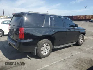 2018 Chevrolet Tahoe LS with VIN 1GNSCAKC9JR201994, listed as a Copart auction lot 53100735 with 182,460 mi miles and Salvage title. Bid and sale history available at DreamBid. Image 3.