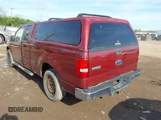 2005 Ford F-150 XLT with VIN 1FTPX12505FB69853, listed as a IAAI auction lot 42092756 with 330,699 mi miles. Bid and sale history available at carsss.com. Image 3.