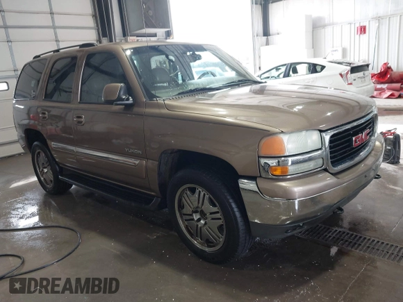 2004 GMC Yukon SLT with VIN 1GKEK13Z84R265500, listed as a IAAI auction lot 41412544 with 259,575 mi miles. Bid and sale history available at carsss.com. Image 1.