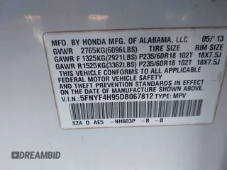 2013 Honda Pilot Touring with VIN 5FNYF4H95DB067812, listed as a IAAI auction lot 40919050 with 256,087 mi miles. Bid and sale history available at carsss.com. Image 9.