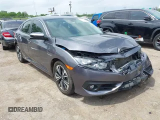 2016 Honda Civic EX-L z VIN 2HGFC1F70GH639126, wystawiony jako IAAI lot #42130445 z przebiegiem 64 136 mil mil oraz . Historia ofert i sprzedaży dostępna na DreamBid. Obrazek 1.