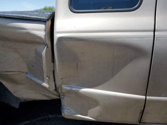 1997 Ford Ranger XL with VIN 1FTCR14A2VPB40920, listed as a Copart auction lot 57128065 with 179,876 mi miles and Salvage title. Bid and sale history available at DreamBid. Image 10.