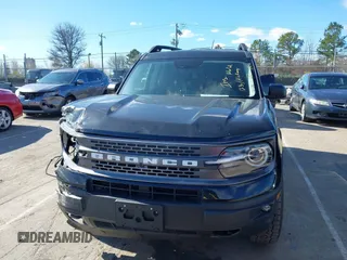 2023 Ford Bronco Sport Badlands z VIN 3FMCR9D95PRD26169, wystawiony jako IAAI lot #41723643 z przebiegiem 21 181 mil mil oraz . Historia ofert i sprzedaży dostępna na DreamBid. Obrazek 12.