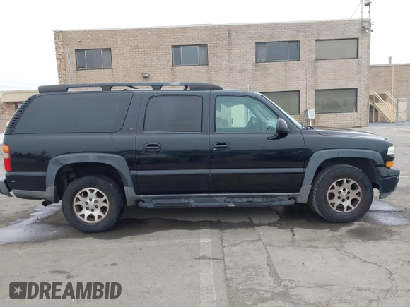 2002 Chevrolet Suburban Z71 with VIN 3GNFK16T12G354322, listed as a IAAI auction lot 41646865 with 229,700 mi miles. Bid and sale history available at carsss.com. Image 13.