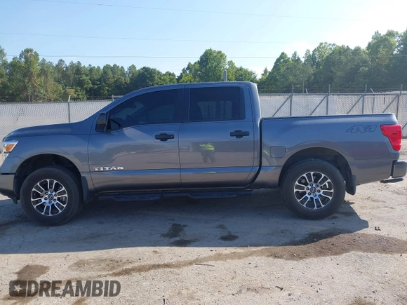 2023 Nissan Titan SV with VIN 1N6AA1EC6PN101712, listed as a IAAI auction lot 40206621 with 50,210 mi miles and . Bid and sale history available at DreamBid. Image 14.