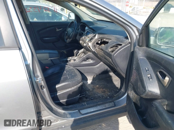 2013 Hyundai Tucson GLS with VIN KM8JU3AC0DU572232, listed as a IAAI auction lot 41724332 with 232,661 mi miles. Bid and sale history available at carsss.com. Image 5.