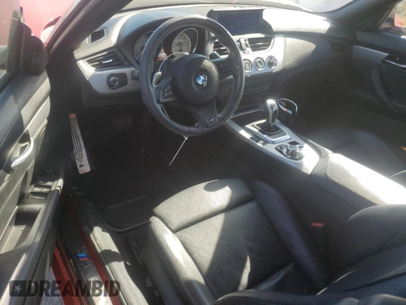 2012 BMW Z4 sDrive35is with VIN WBALM1C58CE633610, listed as a Copart auction lot 42824955 with 84,901 mi miles and Salvage title. Bid and sale history available at DreamBid. Image 8.