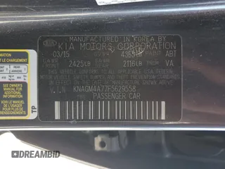 2015 Kia Optima LX z VIN KNAGM4A77F5629558, wystawiony jako Copart lot #55863825 z przebiegiem 143 620 mil mil oraz Szkoda całkowita • Salvage title. Historia ofert i sprzedaży dostępna na DreamBid. Obrazek 12.