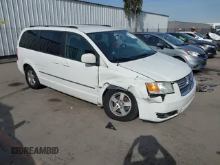 2010 Dodge Grand Caravan SXT z VIN 2D4RN5D12AR219285, wystawiony jako IAAI lot #40946515 z przebiegiem 291 511 mil mil oraz . Historia ofert i sprzedaży dostępna na DreamBid. Obrazek 1.