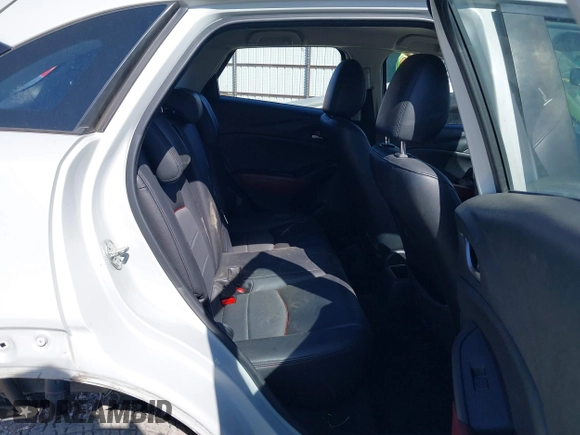 2018 Mazda CX-3 Touring z VIN JM1DKFC77J0331828, wystawiony jako IAAI lot #40482555 z przebiegiem 101 473 mil mil oraz . Historia ofert i sprzedaży dostępna na DreamBid. Obrazek 8.