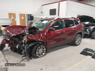 2021 Jeep Cherokee Latitude Lux with VIN 1C4PJMMX1MD131043, listed as a IAAI auction lot 41824130 with 56,414 mi miles and . Bid and sale history available at carsss.com. Image 2.