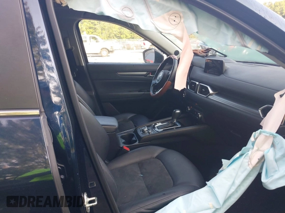 2017 Mazda CX-5 Touring with VIN JM3KFBCL6H0170455, listed as a IAAI auction lot 40381242 with 71,520 mi miles. Bid and sale history available at carsss.com. Image 5.