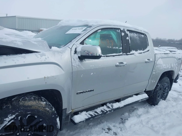 2015 GMC Canyon 4WD SLT with VIN 1GTG6CE36F1257975, listed as a IAAI auction lot 41607688 with 127,523 mi miles. Bid and sale history available at carsss.com. Image 14.