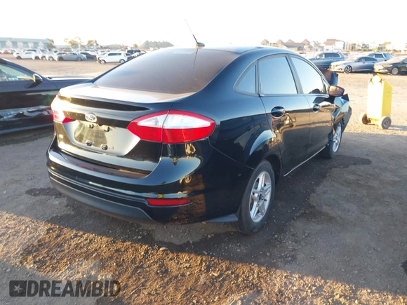 2018 Ford Fiesta SE with VIN 3FADP4BJ0JM121836, listed as a IAAI auction lot 41575608 with 74,010 mi miles. Bid and sale history available at carsss.com. Image 4.