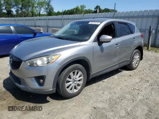 2014 Mazda CX-5 Touring with VIN JM3KE4CY9E0415402, listed as a Copart auction lot 56576114 with 181,719 mi miles and Salvage Title. Bid and sale history available at carsss.com. Image 1.