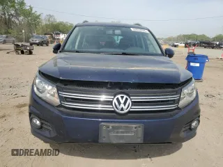 2012 Volkswagen Tiguan S with VIN WVGBV7AX1CW561870, listed as a Copart auction lot 53932255 with 105,972 mi miles and Salvage Title. Bid and sale history available at DreamBid. Image 5.