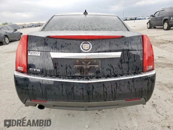 2012 Cadillac CTS z VIN 1G6DA5E54C0100982, wystawiony jako Copart lot #51357945 z przebiegiem 100 798 mil mil oraz Szkoda całkowita • Salvage title. Historia ofert i sprzedaży dostępna na DreamBid. Obrazek 6.