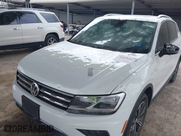 2018 Volkswagen Tiguan SEL with VIN 3VV2B7AX8JM120443, listed as a IAAI auction lot 42154773 with 70,256 mi miles and . Bid and sale history available at DreamBid. Image 6.