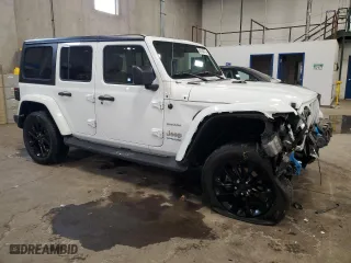 2022 Jeep Wrangler 4xe Unlimited Sahara with VIN 1C4JJXP65NW272312, listed as a Copart auction lot 45154875 with 28,263 mi miles and Salvage Title. Bid and sale history available at carsss.com. Image 4.