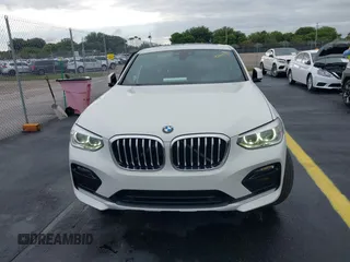 2020 BMW X4 xDrive30i z VIN 5UX2V1C02LLE68148, wystawiony jako IAAI lot #42253362 z przebiegiem 80 865 mil mil oraz . Historia ofert i sprzedaży dostępna na DreamBid. Obrazek 12.