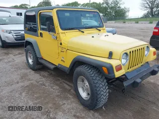 2000 Jeep Wrangler Sport z VIN 1J4FA49S3YP781614, wystawiony jako IAAI lot #42292668 z przebiegiem 152 600 mil mil oraz . Historia ofert i sprzedaży dostępna na DreamBid. Obrazek 1.