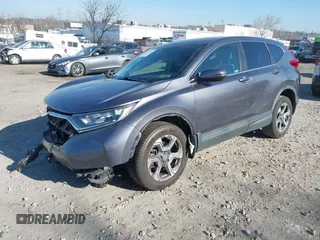 2018 Honda CR-V EX with VIN 7FARW2H55JE102385, listed as a IAAI auction lot 41768265 with 65,380 mi miles. Bid and sale history available at carsss.com. Image 2.